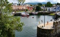 Children jumping from pier into sea, Puerto de Vega, Asturias, Spain