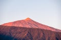 Puerto der la Cruz - Panoramic view on the peak of volcano Pico del Teide during sunrise seen from the port of Puerto de la Cruz Royalty Free Stock Photo