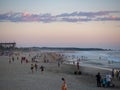 Puerto Escondido, Oaxaca, Mexico, South America: [Sunset at the local beach, lighthouse, crowdwed beach, tourist destination] Royalty Free Stock Photo