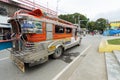 Puerto Galera, Philippines - January 9, 2017: Jeepney staying to pick up passengers, crossroad, day time