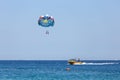 Puerto Galera, Sabang, Philippines - April 4, 2017: Two people parasailing in a blue sky Royalty Free Stock Photo