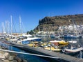 Boats docked in the port of Puerto MogÃÂ¡n, Gran Canaria Island. Royalty Free Stock Photo