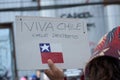 `Long live chile`. Chilean people in a massive protest at Puerto Montt. Chilean flag