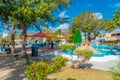 Puerto Morelos, Mexico - January 10, 2018: Outdoor view of a huge christmast tree and unidentified people walking in the Royalty Free Stock Photo