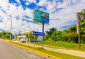 Puerto Morelos, Mexico - January 10, 2018: Outdoor view of informative sign located at one side of the highway of Puerto Royalty Free Stock Photo