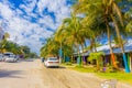 Puerto Morelos, Mexico - January 10, 2018: Outdoor view of some houses with many cars parked in the street of Puerto Royalty Free Stock Photo