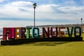 Puerto Nuevo, Mexico September 10, 2023: Photograph of the Puerto Nuevo town sign on the shores of the Pacific Ocean.