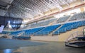 Puerto Princesa, the Philippines - 27 Nov 2018: empty stadium with plastic chairs and stage. Sport coliseum building
