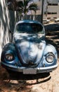 Old vintage volkswagen beetle parked in the shade