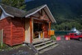 PUERTO VARAS, CHILE, SEPTEMBER, 23, 2018: Outdoor view of house buildings and some cars parked in the shore of National