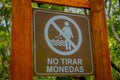 PUERTO VARAS, CHILE, SEPTEMBER, 23, 2018: Outdoor view of informative sign of do throw coins to the river Petrohue in