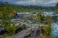 PUERTO VARAS, CHILE, SEPTEMBER, 23, 2018: Outdoor view of Unidentified people enjoying the beautiful waterfalls in Royalty Free Stock Photo