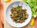 Puff Ball Mushrooms salad spicy with herb and spices on plate lettuce vegetable on table Thai Asian food Royalty Free Stock Photo