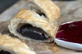 puff pastry bun made of wheat dough and poppy seed filling Royalty Free Stock Photo