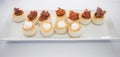 Puff pastry canapes with Iberian chorizo and Torta del Casar cheese