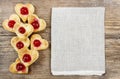 Puff pastry cookies in heart shape filled with cherries Royalty Free Stock Photo