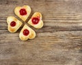 Puff pastry cookies in heart shape filled with cherries Royalty Free Stock Photo