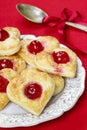 Puff pastry cookies in heart shape filled with cherries Royalty Free Stock Photo