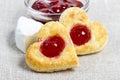 Puff pastry cookies in heart shape filled with cherries Royalty Free Stock Photo