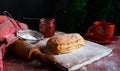 Puff pastry dessert red jam viburnum cherry cup coffee black background