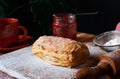 Puff pastry dessert red jam viburnum cherry cup coffee black background