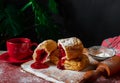 Puff pastry dessert red jam viburnum cherry cup coffee black background