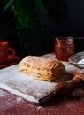 Puff pastry dessert red jam viburnum cherry cup coffee black background