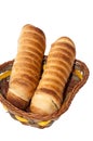 Puff pastry with a hot dog in a wicker basket Royalty Free Stock Photo
