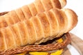 Puff pastry with a hot dog in a wicker basket Royalty Free Stock Photo