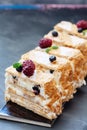 Puff pastry napoleon cake with vanilla cream and berries