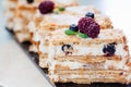 Puff pastry napoleon cake with vanilla cream and berries