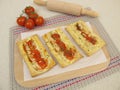 Puff pastry pizza with tomato and cheese Royalty Free Stock Photo