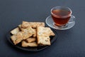 Puff pastry with raisins and cup of tea Royalty Free Stock Photo