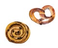 Puff pastry roll with raisins and pretzel with salt. Royalty Free Stock Photo