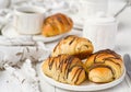 Puff pastry rolls with chocolate and coffee cup Royalty Free Stock Photo
