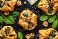 Puff pastry stuffed with spinach and Gorgonzola cheese on a dark background Royalty Free Stock Photo