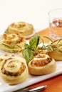 Puff pastry swirls with herb filling