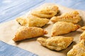 Puff pastry triangles filled with feta cheese and leek. Royalty Free Stock Photo