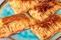 Puff pastry turnovers with cheese for dessert . Puff pastry with cheese on a plate Royalty Free Stock Photo