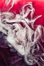 Puff of smoke on red Royalty Free Stock Photo