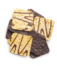 Puffed corn crackers chocolate covered isolated on white background Royalty Free Stock Photo