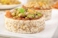 Puffed exploded wheat grains with pistachios and candied fruits on a thin layer of apricot jam and Puffed exploded wheat grains