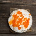 Rice crackers with smoked salmon spread on old wooden surface Royalty Free Stock Photo