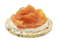 Puffed rice cake with salmon slices isolated on white background