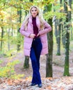 Puffer fashion concept. Outfit prove puffer coat can look stylish. Girl fashionable blonde walk in park. Jackets