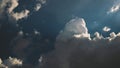 Puffy clouds against a clean and bright blue sky