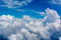 Puffy Clouds on Blue Sky Background