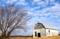 Puffy Clouds, Intricate Branche, Greying Barn Royalty Free Stock Photo