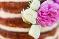 Puffy wedding cake with pink nd white flowers Royalty Free Stock Photo