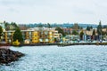 Seattle Beach Dock Puget Sound Washington State Harbor Boat Yellow Apartment Blue Water Rocks Trees Evergreen Beautiful Bay Landsc Royalty Free Stock Photo